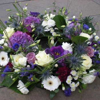 Bedwyn - Cream and Blue. Funeral Wreath - Millefiori Flowers Shaftesbury, Gillingham and Wincanton